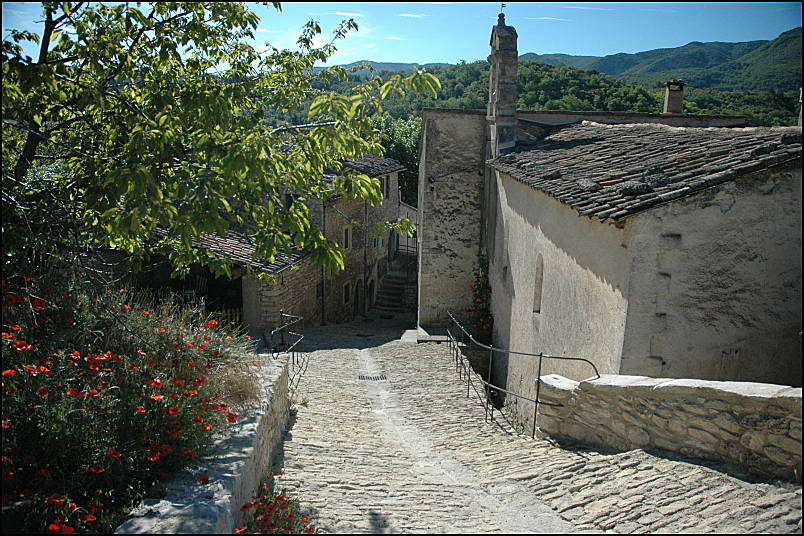 Main street downtown Buoux with stone calade